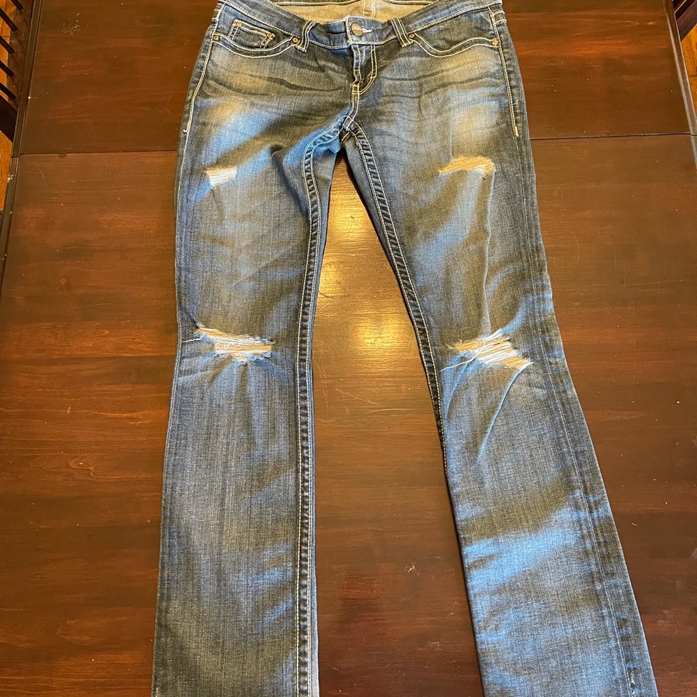 Distressed straight leg jeans